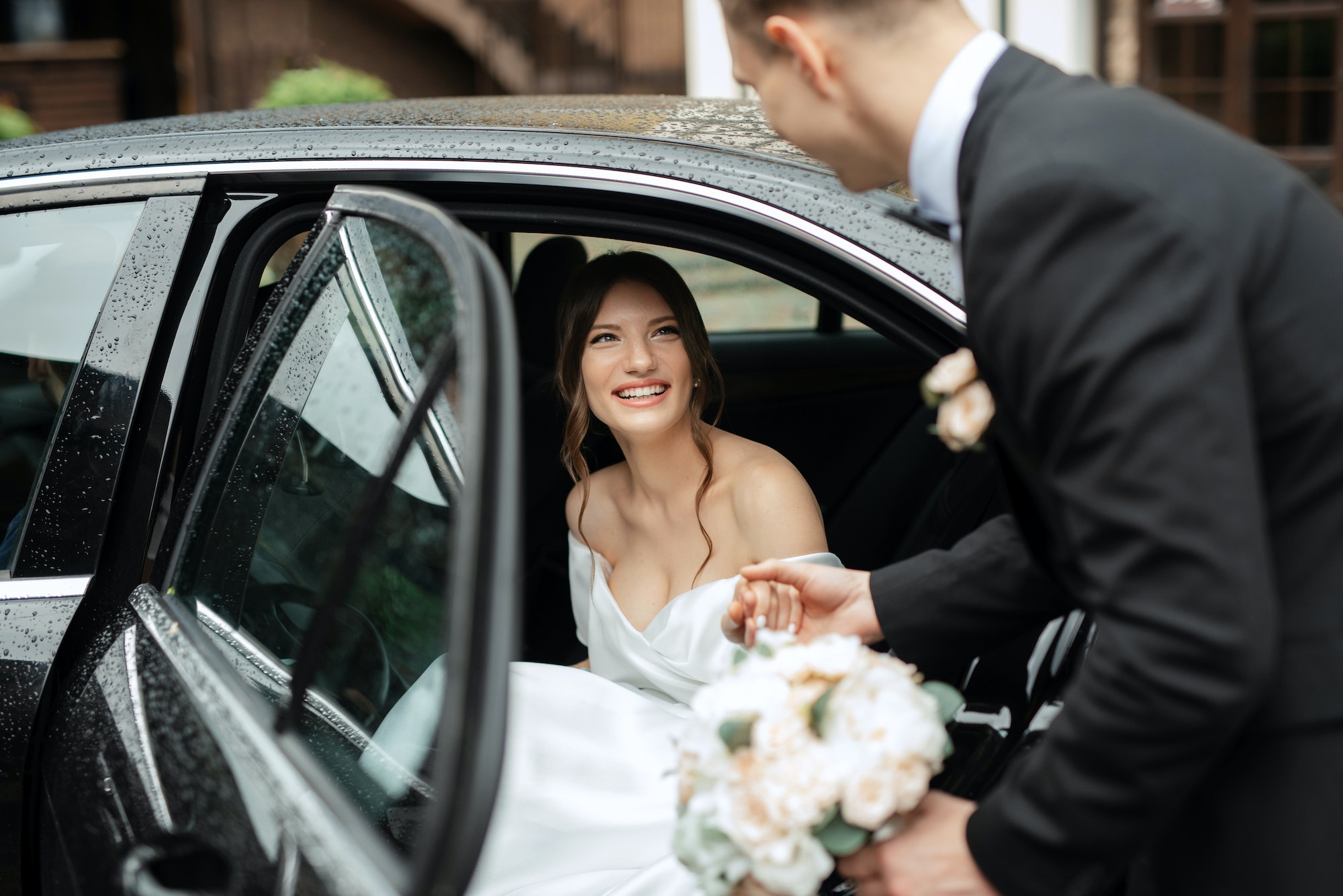 young couple bride and groom in a white short dress