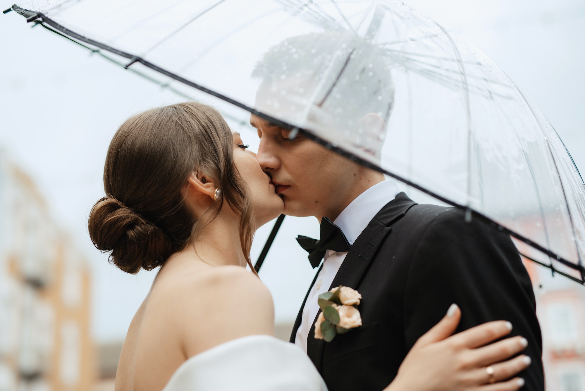 young couple bride and groom in a white short dress
