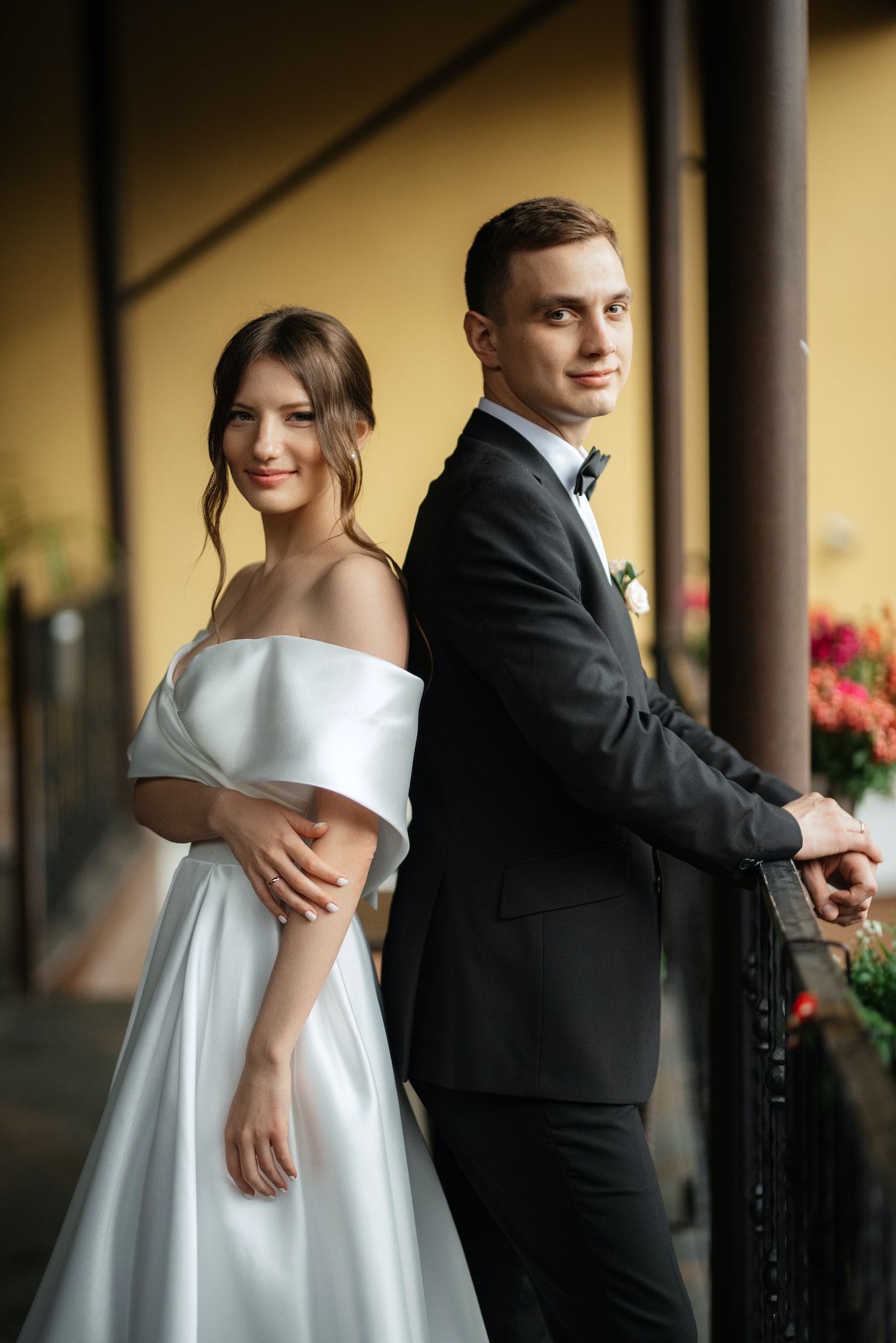 young couple bride and groom in a white short dress